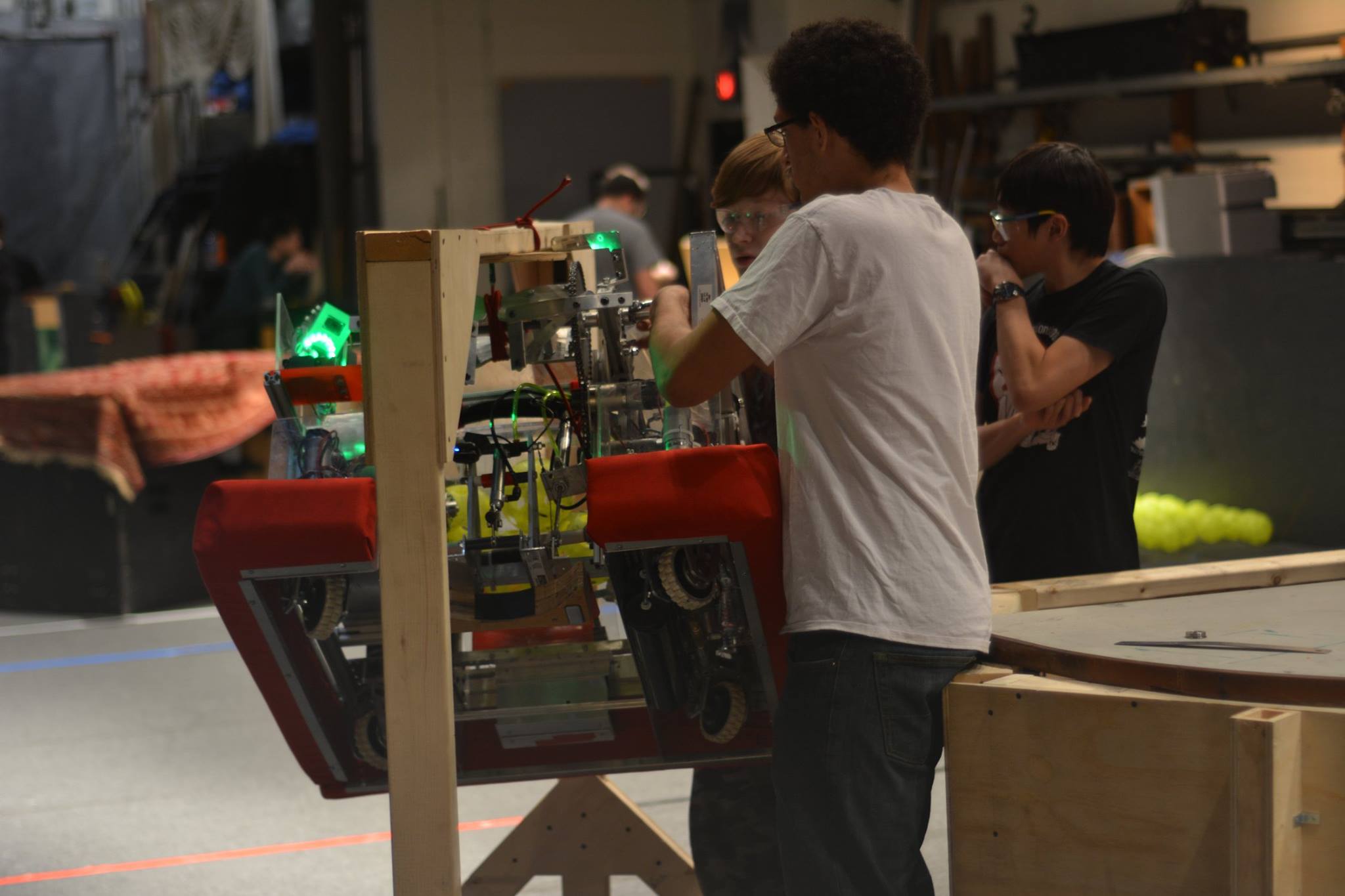 The 2017 robot being carried onto the ground.